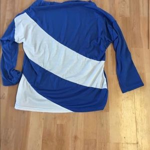 Ladies light shirt. Fits like a medium. Brand new